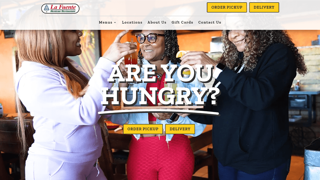 La Fuente Mexican Restaurant website screenshot with three women sharing food and drinks. Text: 