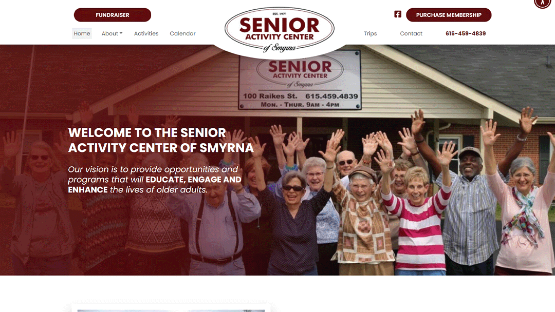Homepage of the Senior Activity Center of Smyrna, featuring a group of cheerful seniors standing in front of the center with their hands raised. The text 